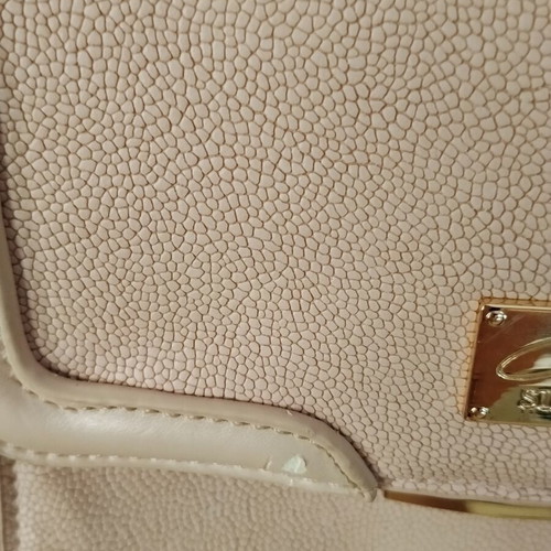 Axel pink shoulder bag used with gold details