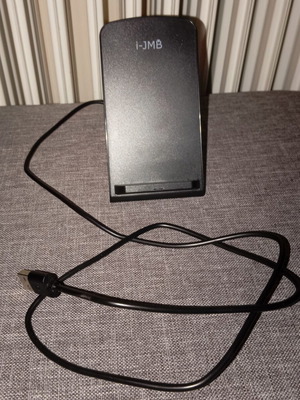 Wireless charging stand like new for mobile phones