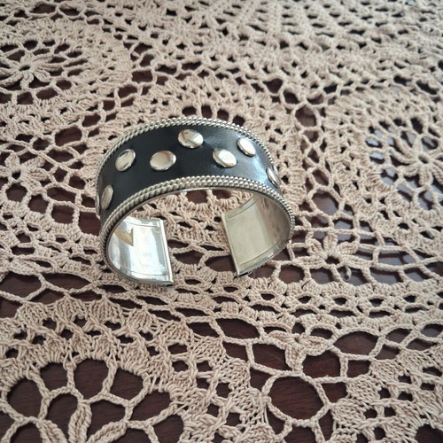 Metal bracelet with studs like new, leather and metal
