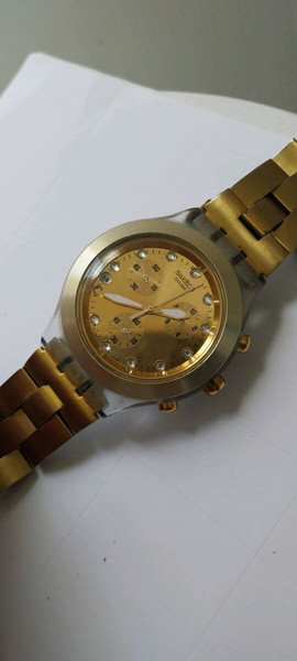 swatch swiss collection gold