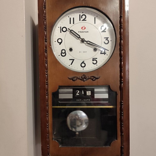 Frontier 31 Day mechanical wooden wall clock with pendulum and calendar like new
