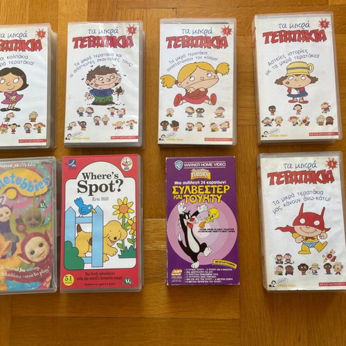 Used videocassettes pack of 17 with children’s and movie titles