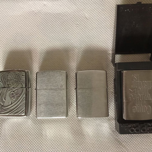Zippo lighters set of four like new