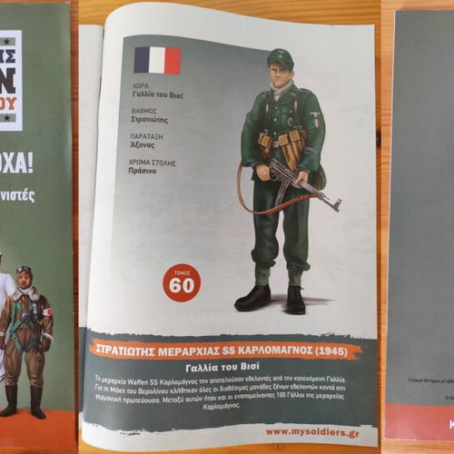 World War II Soldier Miniatures Collection like new, 37 pieces with stands and guide