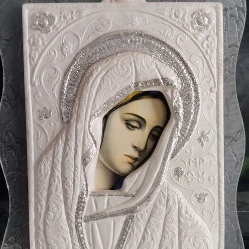 Virgin Mary image used with glass background and embossed design