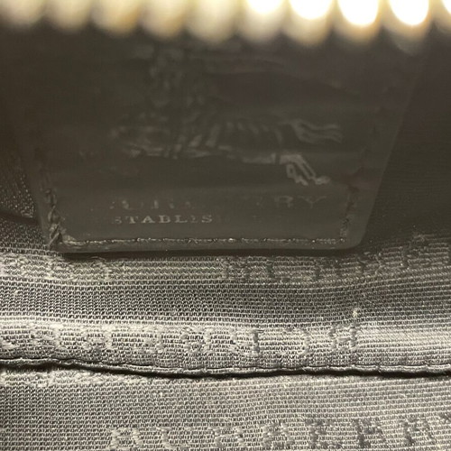 Burberry luxury toiletry bag used with defects