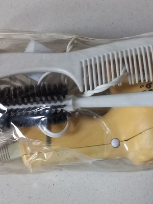 Travel hair dryer used with comb and brush in zipper pouch