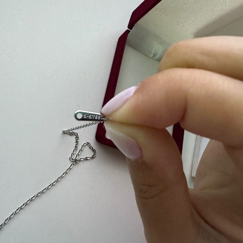 Steel cross necklace silver color, chain length 22 cm