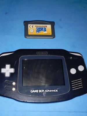 Nintendo Game Boy Advance console with Super Mario 3 cartridge