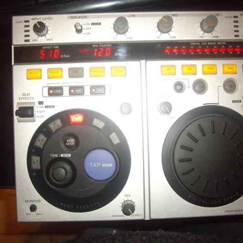 Pioneer DJM-500 mixer and Pioneer EFX500 silver effect processor used