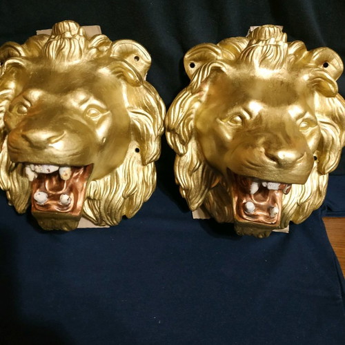 Decorative items used, cast iron lion heads, old antiques