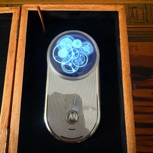 Motorola Aura used silver mobile phone