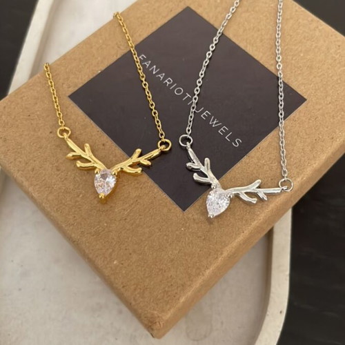 Deer pendant new, gold and silver steel