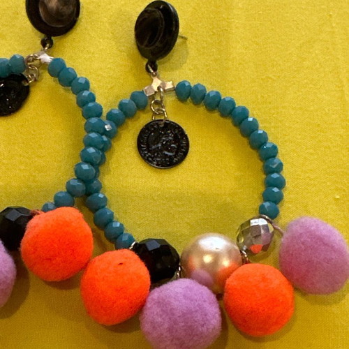 Colorful hoop earrings used handmade with pom poms and button closure