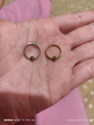 Steel piercing earrings used, multicolor and yellow