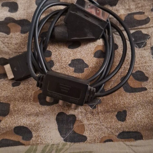 Sony PlayStation 2 console with 2 controllers, memory card and 5 games