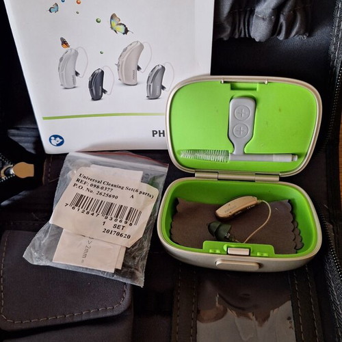 Phonak Audéo V hearing aid with case and cleaning accessories