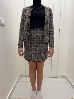 Chanel women's set new with mini skirt and crop jacket