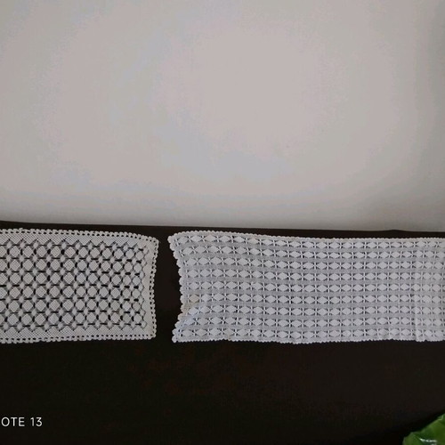 Table linens used, set of two doilies with different designs