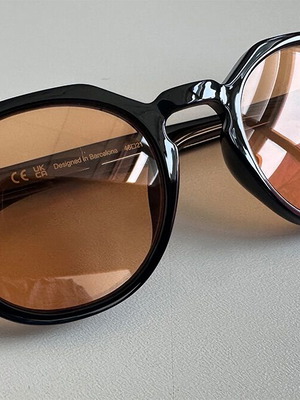 Meller Sunglasses new, black frame yellow lenses
