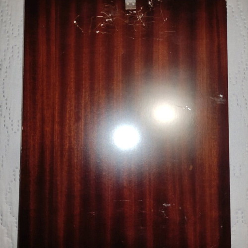 Silver icon of Christ with natural wood frame used