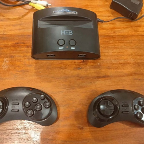 Sega Mega Drive Mini console like new with wireless controllers and preinstalled games