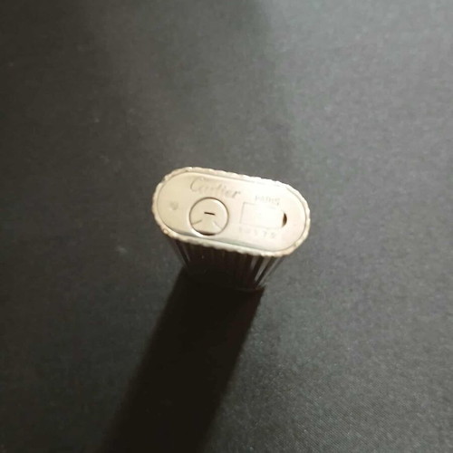 Cartier lighter used silver with vertical grooves