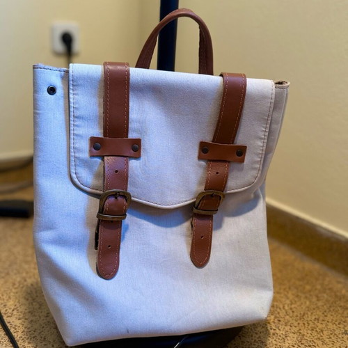 Blue backpack with brown leather details like new