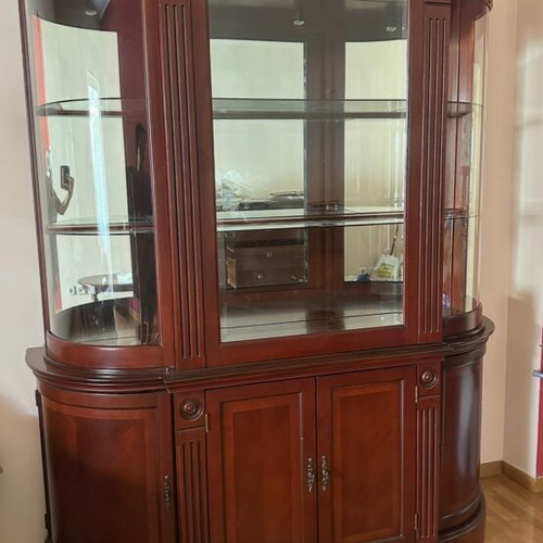 Classic wooden living room buffet with glass shelves and mirror