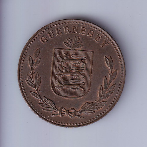 Guernsey 8 Doubles 1914 coin used with nice details