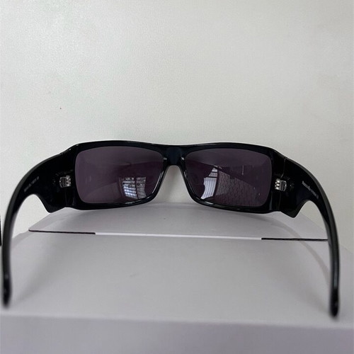 Rebecca Blu women's sunglasses with green lenses