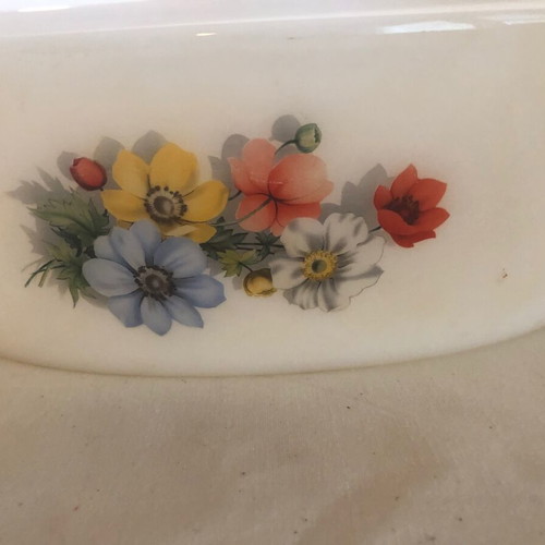 White serving dishes used, oval with lid and large bowl with floral design