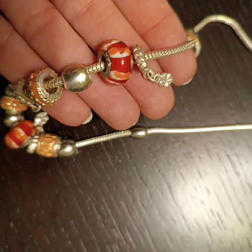 Necklace with charms like new, 45cm length, orange and silver