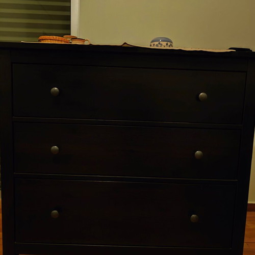 Chest of drawers used, black color with three drawers