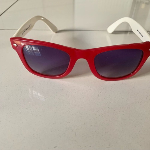 Colored People sunglasses used, red with white arms