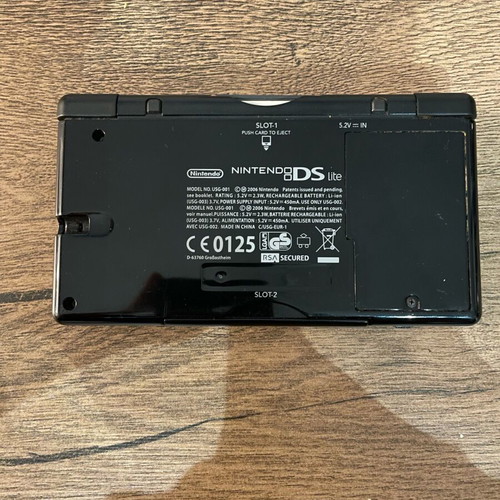 Nintendo DS Lite used, black with cartridge and original charger