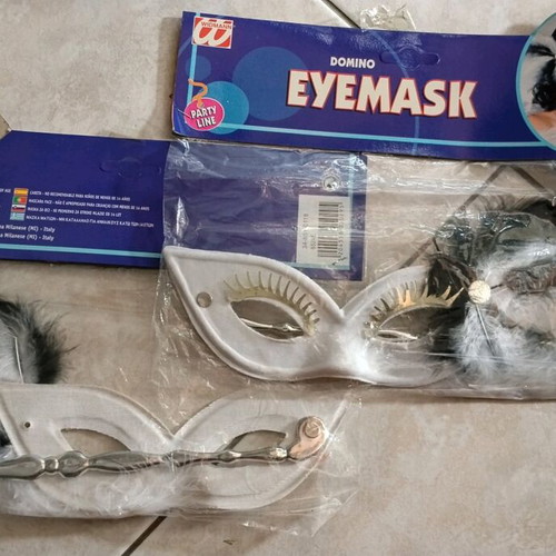 Carnival eye mask with handle in white and black, new