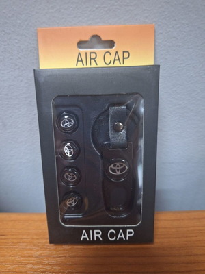Toyota car valve caps new with keychain