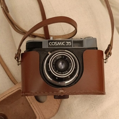 Cosmic 35 camera used, non-functional with leather case