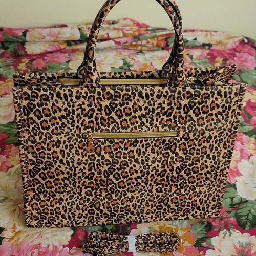 Leopard print women's handbag with strap