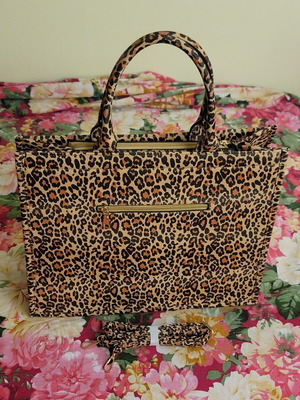 Leopard print women's handbag with strap