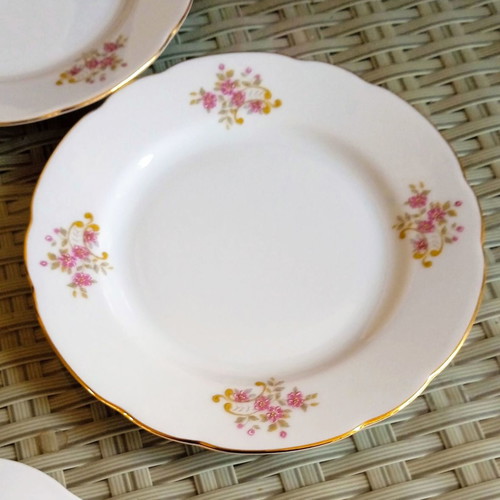 Vintage porcelain platter with six Bohemia Thun plates in excellent condition