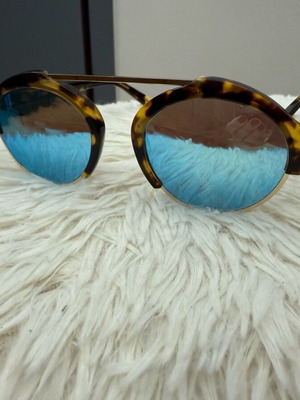 Tortoise sunglasses used with blue mirrored lenses