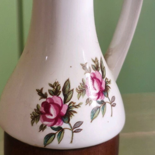 Vintage oil and vinegar cruet set used with porcelain and acacia wood