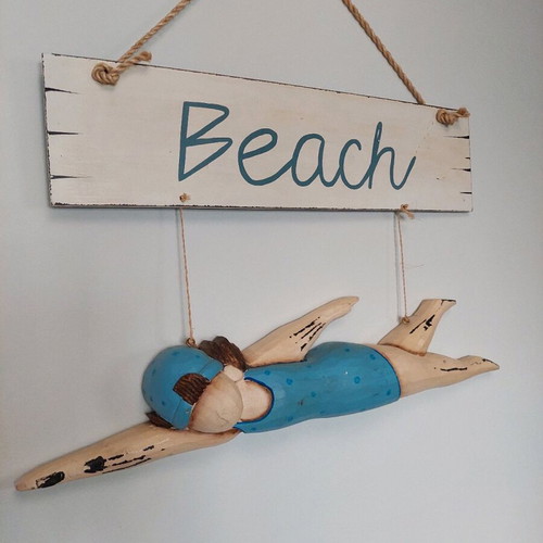 Wooden wall decoration swimmer like new