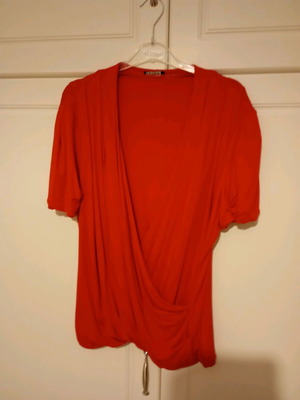 Lola fuchsia wrap blouse like new, size L