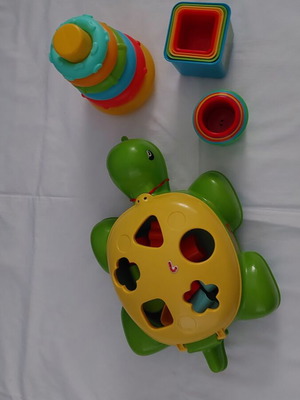 Baby toys like new, set of 4 with turtle and pyramid