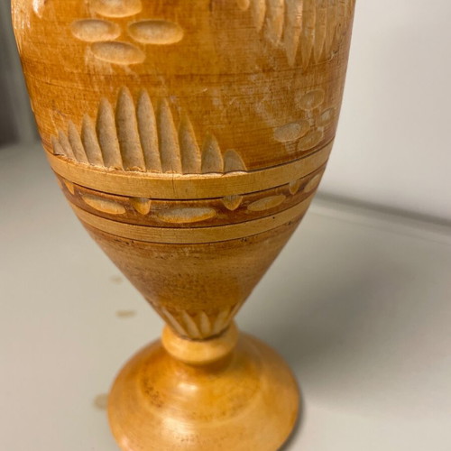Wooden vase made of beech with traditional carved geometric patterns