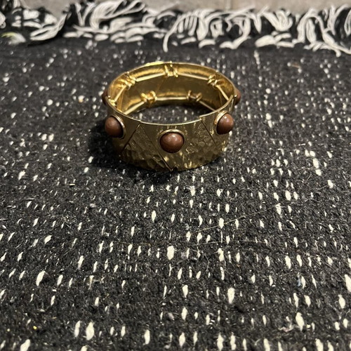 Boho women's elastic cuff bracelet like new, gold with brown stones