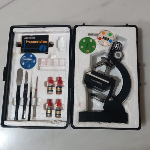 Vintage metal microscope with case and accessories like new